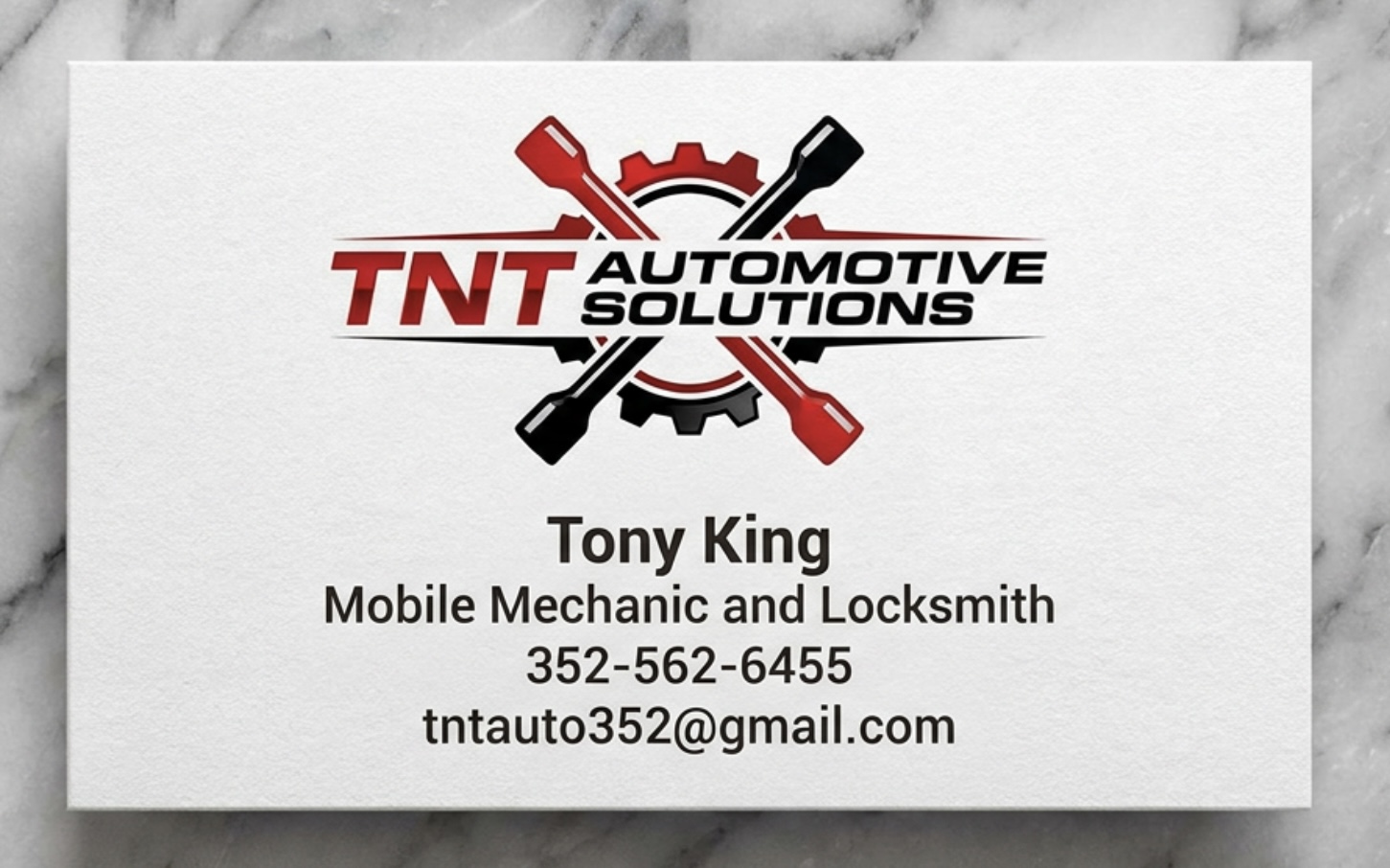 TNT Automotive Solutions logo